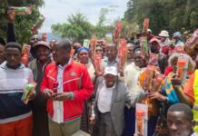 Musomba Distributes Rechargeable Torches to Village Elders, Community Policing Team in Kaiti