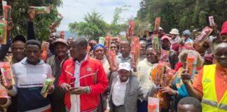 Musomba Distributes Rechargeable Torches to Village Elders, Community Policing Team in Kaiti